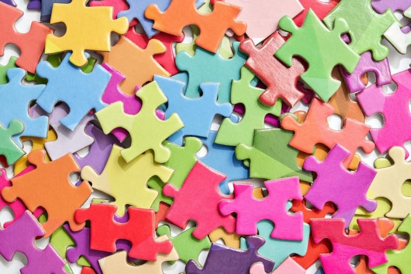 Photograph of multicolored jigsaw puzzle pieces